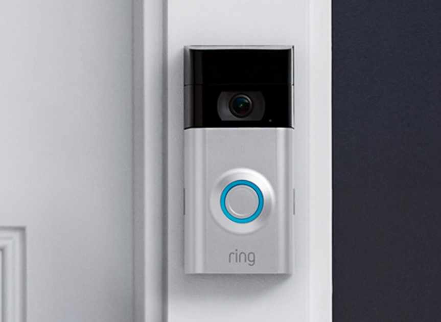 a photo of Ring video doorbell installed on a house