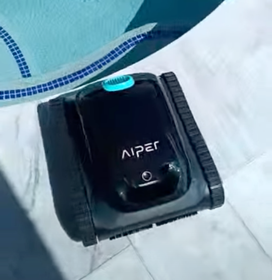 a photo of Aiper Scuba S1 Cordless Robotic Pool Cleaner on a pool deck