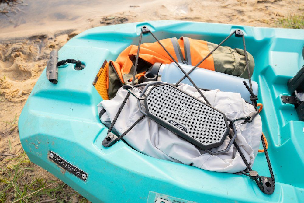 a photo of Altec Lansing's Hydra Wave Portable Speaker with EVERYTHINGPROOF in a boat