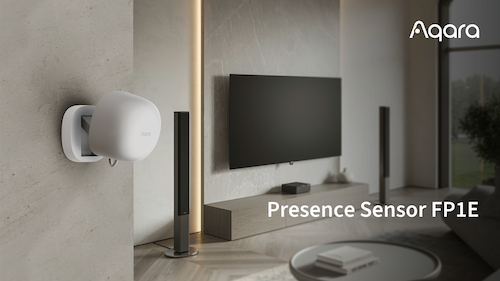 a photo of Aqara Presence Sensor FP1E on a wall in a home.