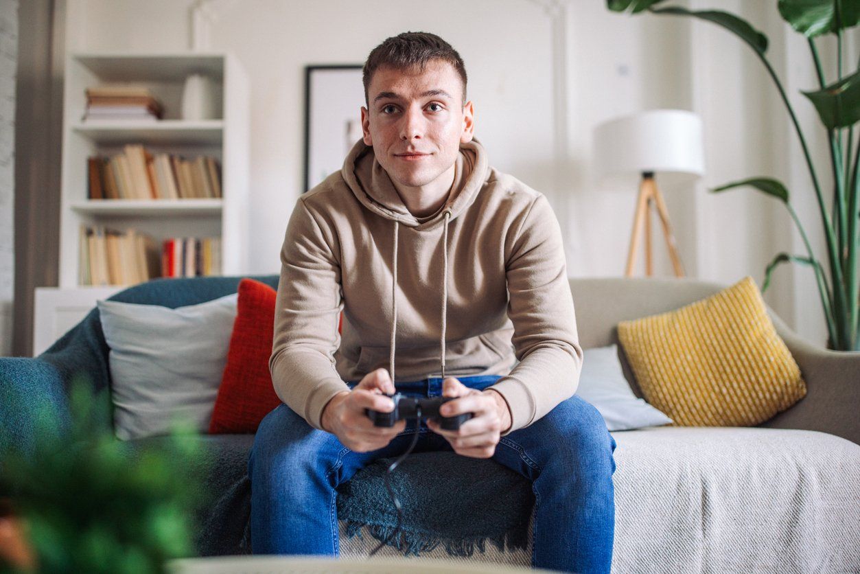 Intense Gaming Session at Home stock photo