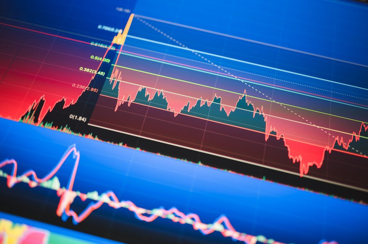 Drawing stockmarket chart forecast possibility in uncertainty financial market stock photo