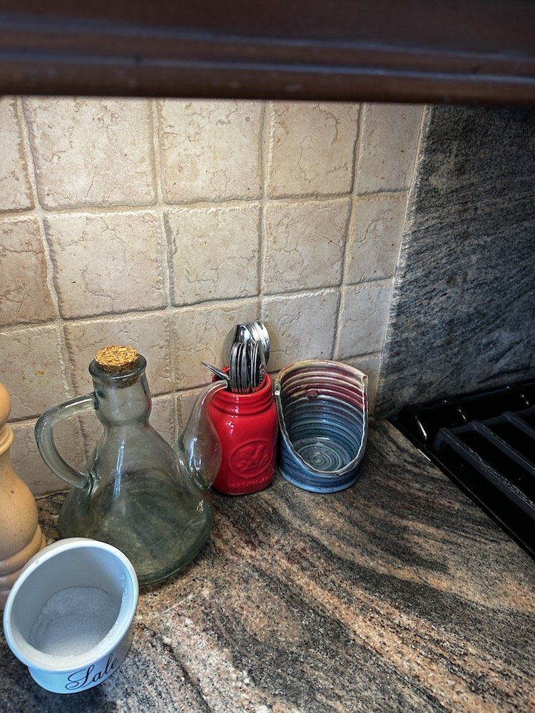 a photo of a countertop lit up with Cync reveal HD+ Smart Undercabinet Bar