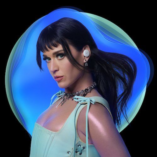 a photo of Katy Perry wearing Denon PerL Earbuds