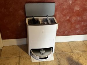 a photo of Ecovacs DEEBOT T20 OMNI Robot Vacuum and Mop installed in a kitchen