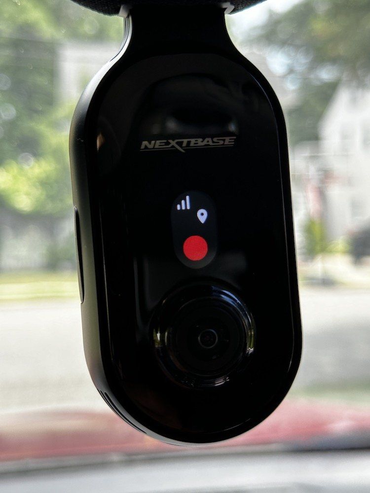 a photo of Nextbase IQ 1K Smart Dash Cam with 4G installed on a car's windshield