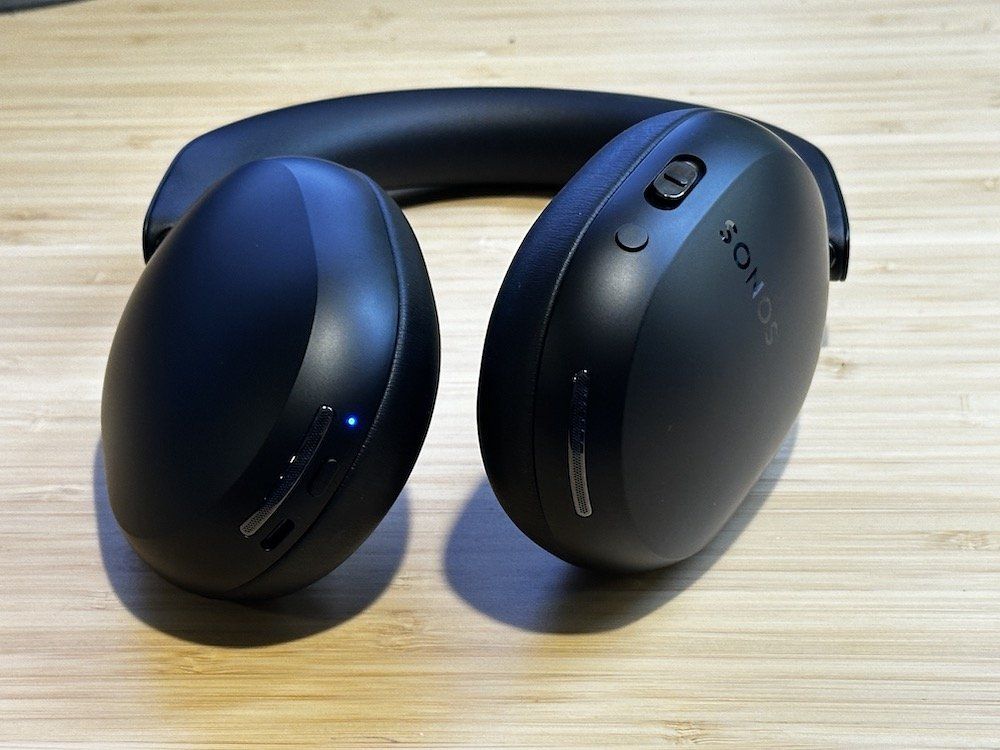 a photo of Sonos Ace Black headphones on a table