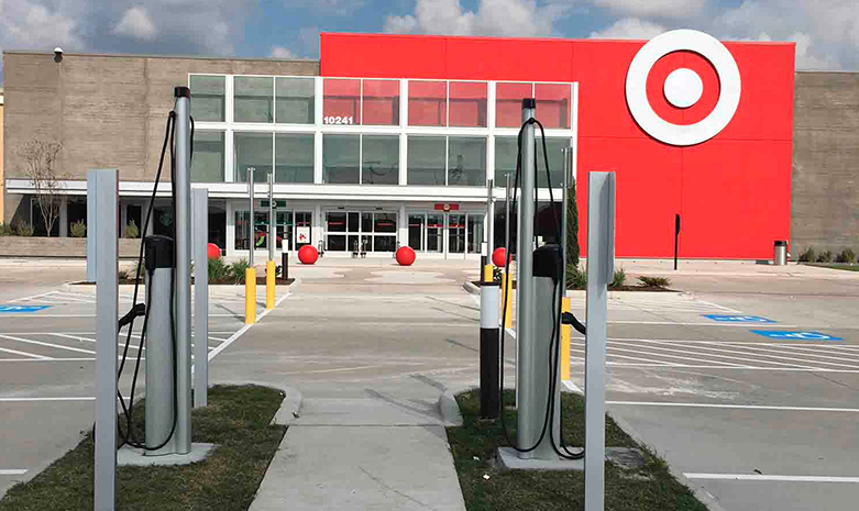 A photo of a Target parking lot with electric car charging stations