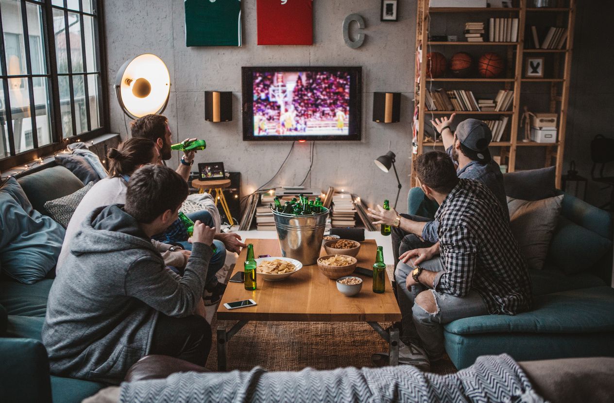 photo of students watching sports on a smart tv