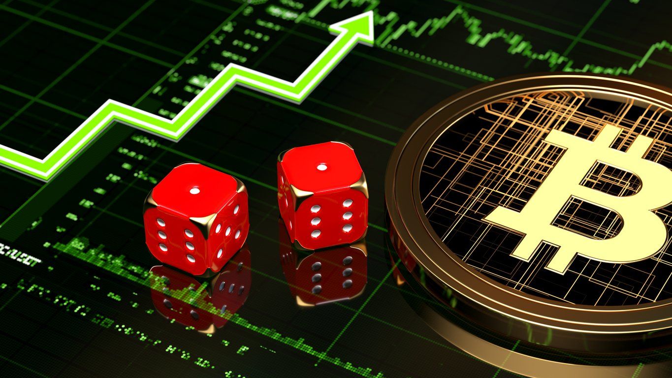 a photo of dice and bitcoin and graph showing upward trends