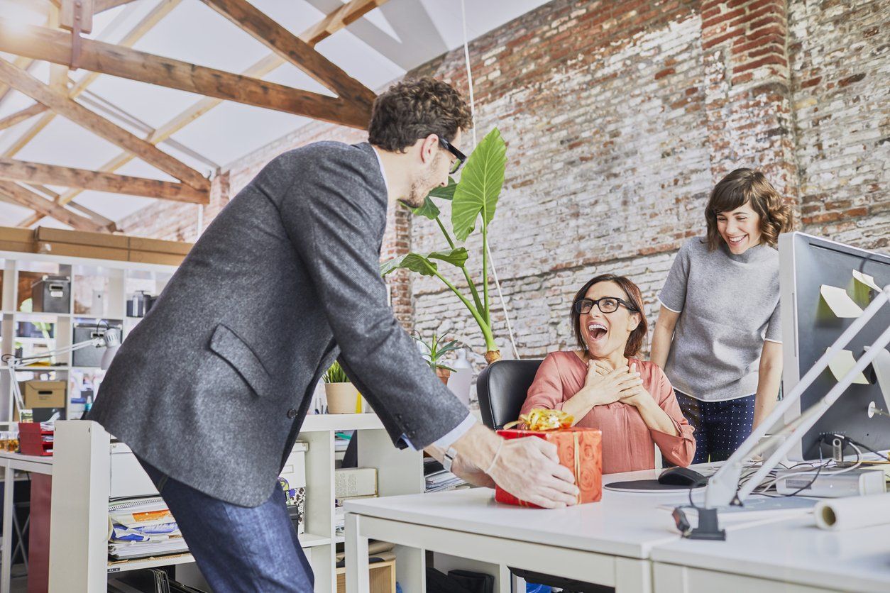 161218 Small business, working at the office. Birthday celebration. stock photo