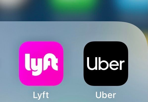 Lyft and Uber apps on a smartphone