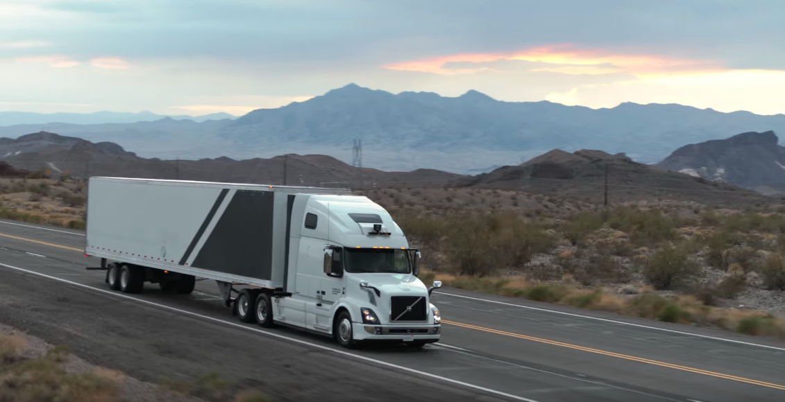 a photo of a self-driving truck driving on the road