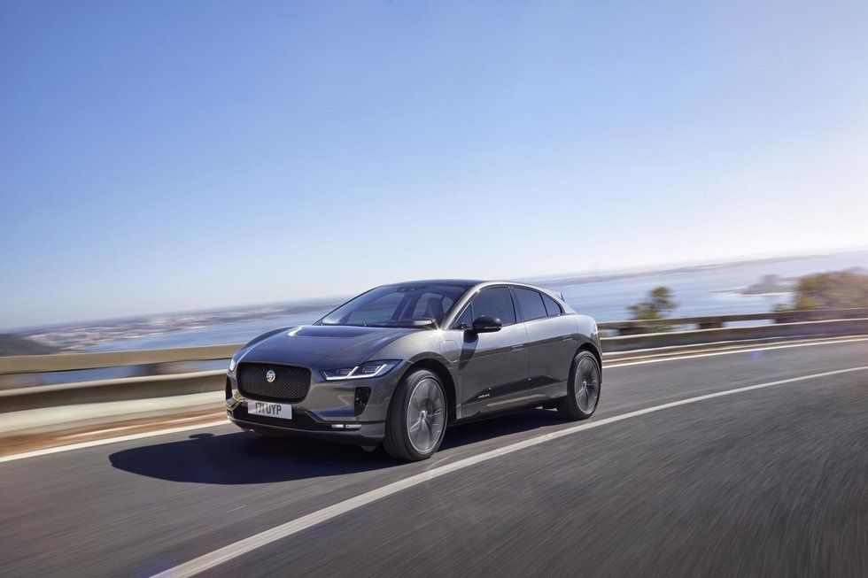 a photo of an ev car on the road