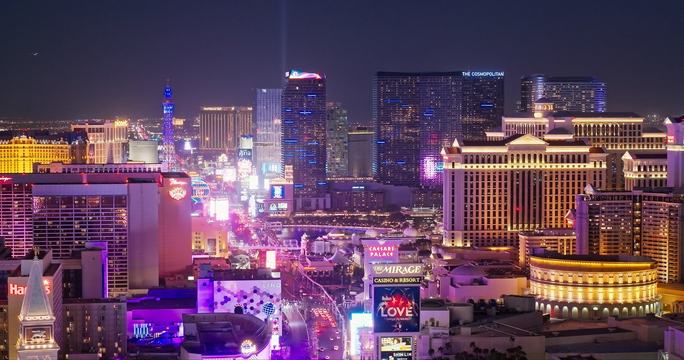 Casinos Along Las Vegas Strip at Night - Aerial stock photo