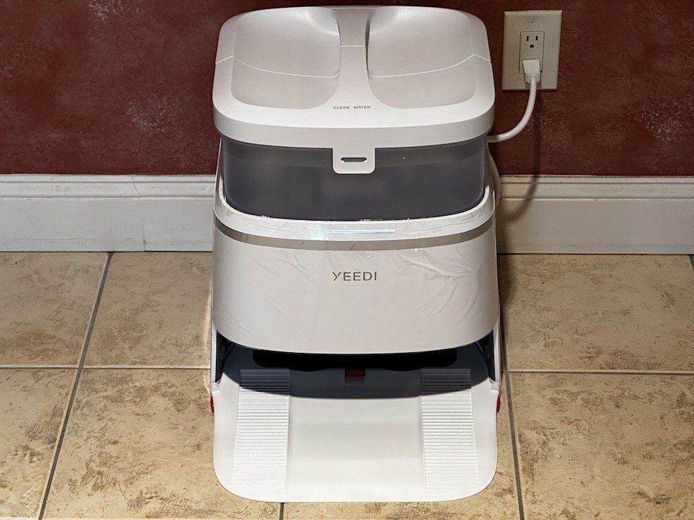 a photo of Yeedi M12 Ultra Plus Robot Vacuum and Mop and Omni Station in a kitchen